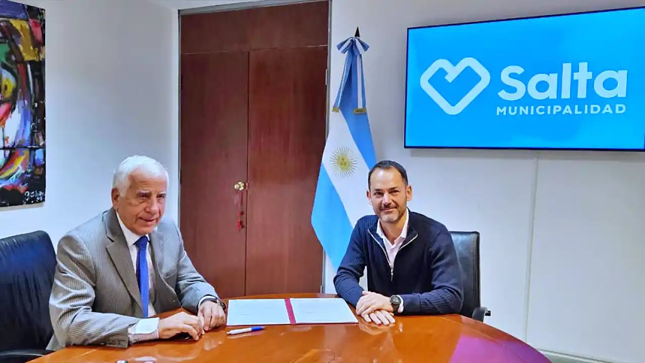 Domínguez y Durand durante la firma del convenio